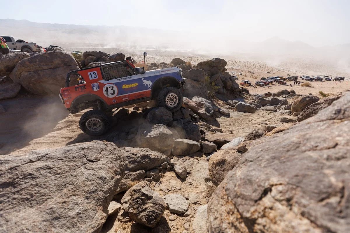 Ford Bronco race truck climbing rocks at King of the Hammers
